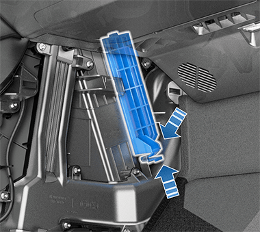 Tesla DIY reference showing cabin-filter-cover access and lower tab release